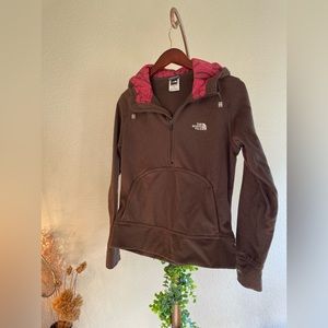 The North Face small brown pullover with front pocket.